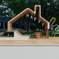 House Shaped Wooden Landscape Seat With HAPPY Lettering And Surrounding Green Trees