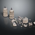 Stone Garden Ornaments With Pointed Top Pillars And Scattered Pieces