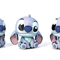 Three Blue Plush Stuffed Toys With Big Ears Round Eyes And Sitting Posture