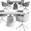 Light Colored Leisure Chairs With Metal Legs Around Modern Black Dining Table