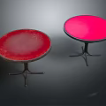 Modern Red Round Tables With Metal Stands On Dark Background Setting