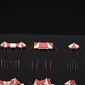 Multiple red and white tents arranged on black background with white structures nearby