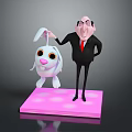 Man in black suit and red tie holding white rabbit toy standing on pink platform