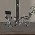 Folding Lounge Chairs with Black Mesh and Silver Metal Frame in Indoor Living Room