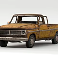 Vintage Rusty Yellow Pickup Truck With Weathered Exterior And Classic Design
