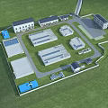 Industrial Factory Complex With Multiple Buildings Green Lawn And Access Roads