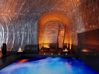 Cave Style Swimming Pool with Blue Water Rock Walls Warm Lighting and Wooden Ladder 3d model