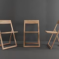 Three Wooden Folding Leisure Chairs Displayed in Different Angles 3d model