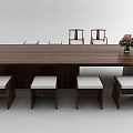 Modern Long Wooden Tea Table With White Cushioned Stools And Pink Flower Arrangement