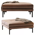 Modern Brown Upholstered Ottoman with Black Legs and Woven Blanket Decor
