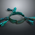 Ancient Bronze Clothing Accessory With Circular Design And Decorative Bells