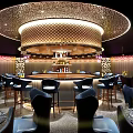 Elegant C BOX Bar Interior Featuring Bar Stools Neon Sign Decorative Lights And Seating