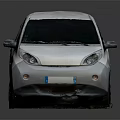 White Small Hatchback Car With Modern Sleek Exterior And Clean Design