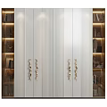 Modern White Wardrobe Interior Design With Vertical Stripes Gold Handles And Side Display Shelves