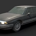 Vintage Dark Gray Sedan With Illuminated Headlights And Silver Rims