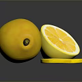 Fresh Ripe Whole Lemon and Sliced Lemon with Juicy Pulp on Dark Surface
