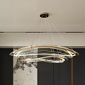 Contemporary Circular Ring Chandelier With Gold Finish Suspended In Modern Living Room Interior