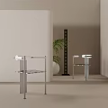 Two Modern Metal Frame Leisure Chairs With Green Plant In Light Colored Room