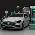 White Mercedes EQE Electric Vehicle Display With Green Plants And Brand Signage
