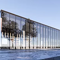 Modern Sales Office Building With Large Glass Curtain Walls And Tree Reflections