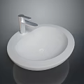 Round White Bathroom Basin With Chrome Faucet And Sleek Modern Design