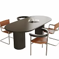 Modern Oval Wooden Table And Four Leather Seat Metal Frame Chairs With Open Book