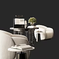 Modern Single Sofa With Side Table Potted Plant And Decorative Books