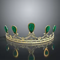 Golden Decorative Crown With Green Gemstones And Ornate Intricate Design Details