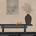Vase with Flowers on Black Console Table with Bowl of Fruits Near Wall Painting