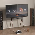 Modern TV Setup On Floor Stand With Speakers Wooden Floor Clock And Decor