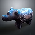 Dark Colored Hippo Ceramic Sculpture With Textured Surface And Artistic Design Elements