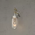 Modern Minimalist Wall Lamp with Transparent Glass and Metal Base on Concrete Wall