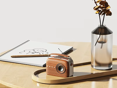 Vintage Wooden Radio Speaker on Light Wood Table with Notebook Pen and Dried Flower Vase 3d model