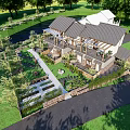 Scenic Guesthouse Building With Courtyard Terrace and Lush Greenery Surrounded by Trees