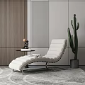 White Lounge Chair With Metal Frame Near Side Table And Cactus By Wooden Gray Walls