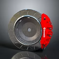Automotive Brake System Components Including Brembo Red Brake Pad And Silver Disc