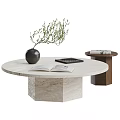 Round Marble Coffee Table With Black Vase Green Foliage Open Book And Black Tablet