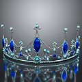 Elegant Silver Crown With Sparkling Blue Gemstones And Intricate Decorations