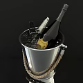 Elegant Wine Bottle And Glass With Silver Ice Bucket Rope Handle On Black Background