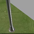 Outdoor Post Light With Sleek Design Illuminated On Grassy Garden Lawn During Evening Time
