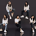 Group of Women in Casual Poses Wearing White Tops Jeans White Sneakers on Dark Background