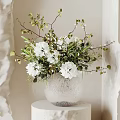 Silver Textured Vase With White Flowers Green Leaves And Branches On White Pedestal