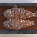 Two Roasted Fish on Metal Tray With Handles and Sauce Labeled Fish on Wooden Floor