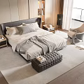 Modern Double Bed With Black Headboard Gray Pillows And Leather Ottoman