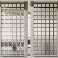 Modern Glass Block Wall Design With Circular And Square Textured Patterns