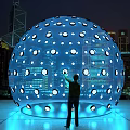 Interactive Zone Featuring Large Blue Sphere White Dots Illuminated At Night City With Human Interaction 3d model