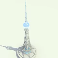 Tall Modern Tower Featuring Glass Sphere Top And Metallic Frame Under Clear Blue Sky