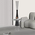 Transparent Modern Side Table With Round Top Beige Patterned Sofa Floor Lamp And White Blinds