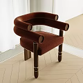 Brown Upholstered Single Seater Sofa With Curved Armrests And Wooden Legs In Light Herringbone Flooring