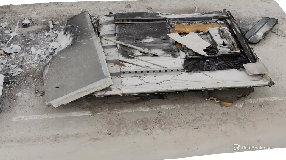 Burned Debris Of Damaged Item On Road Surface With Charred And Broken Parts 3d model 